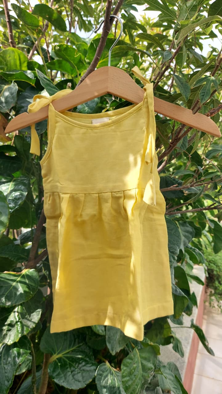 Comfortable cotton baby knot dress designed for gentle everyday wear