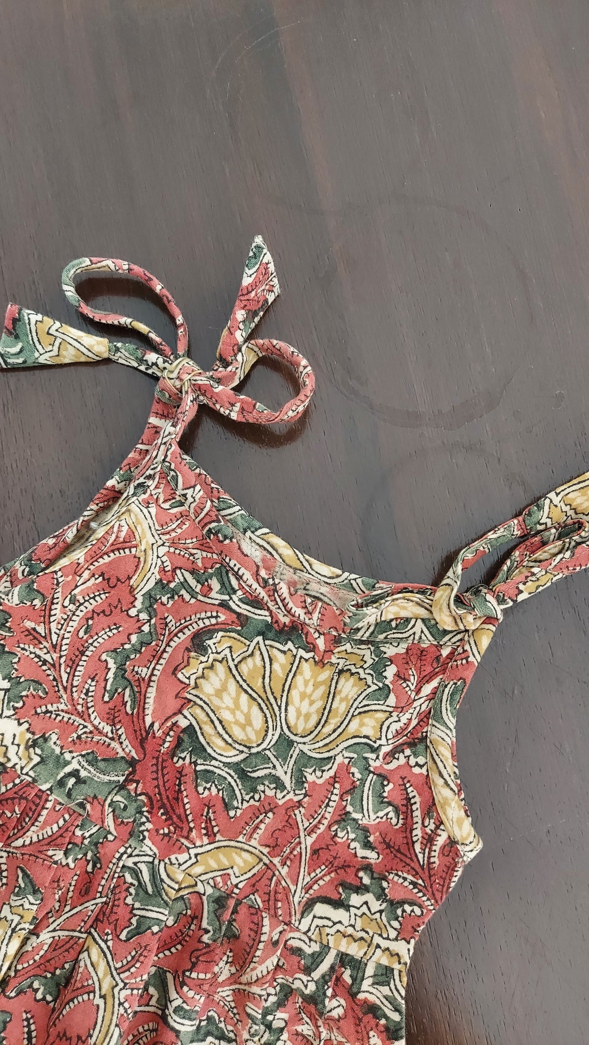 Patterned top on a dark background